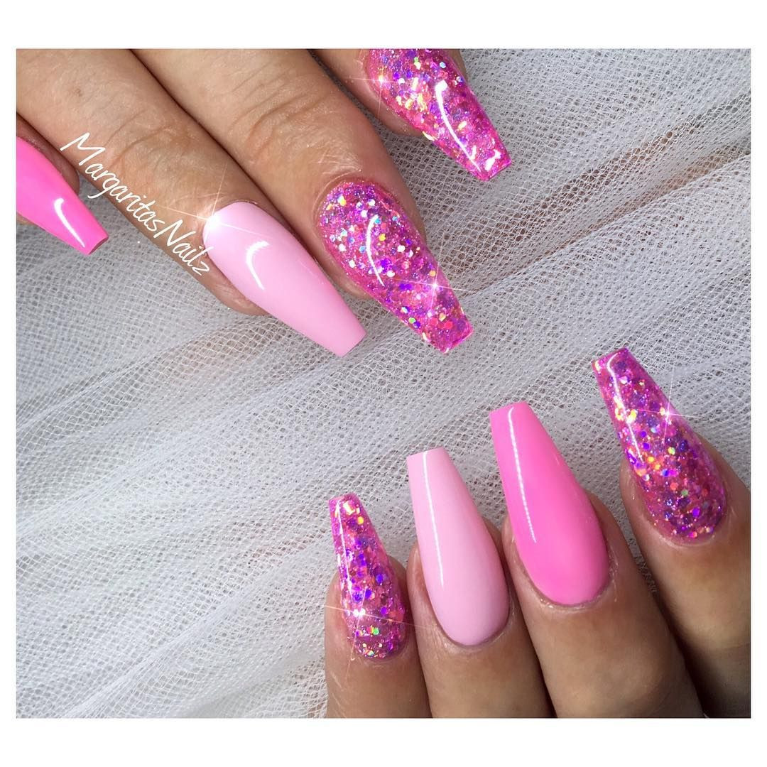 Pink Nails Glitter
 Shades of pink nail art with glitter accent nails