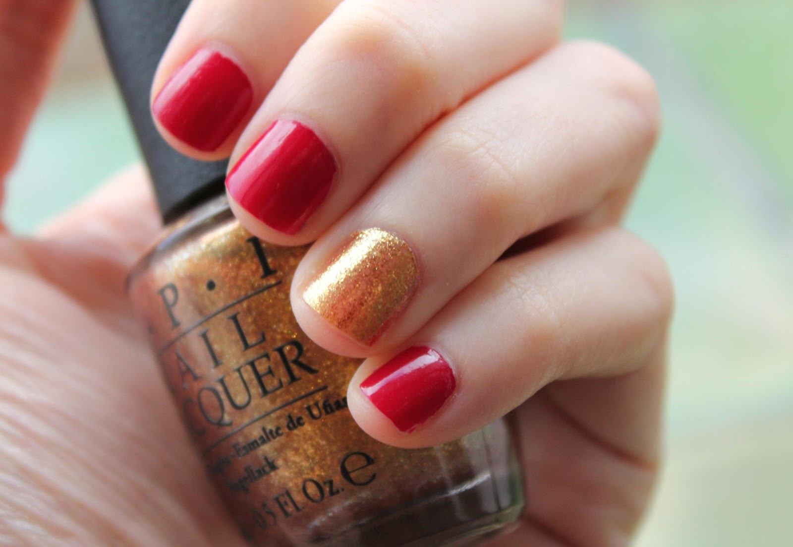 Red And Gold Glitter Nails
 Girly Frame Nail of the day Gold and red