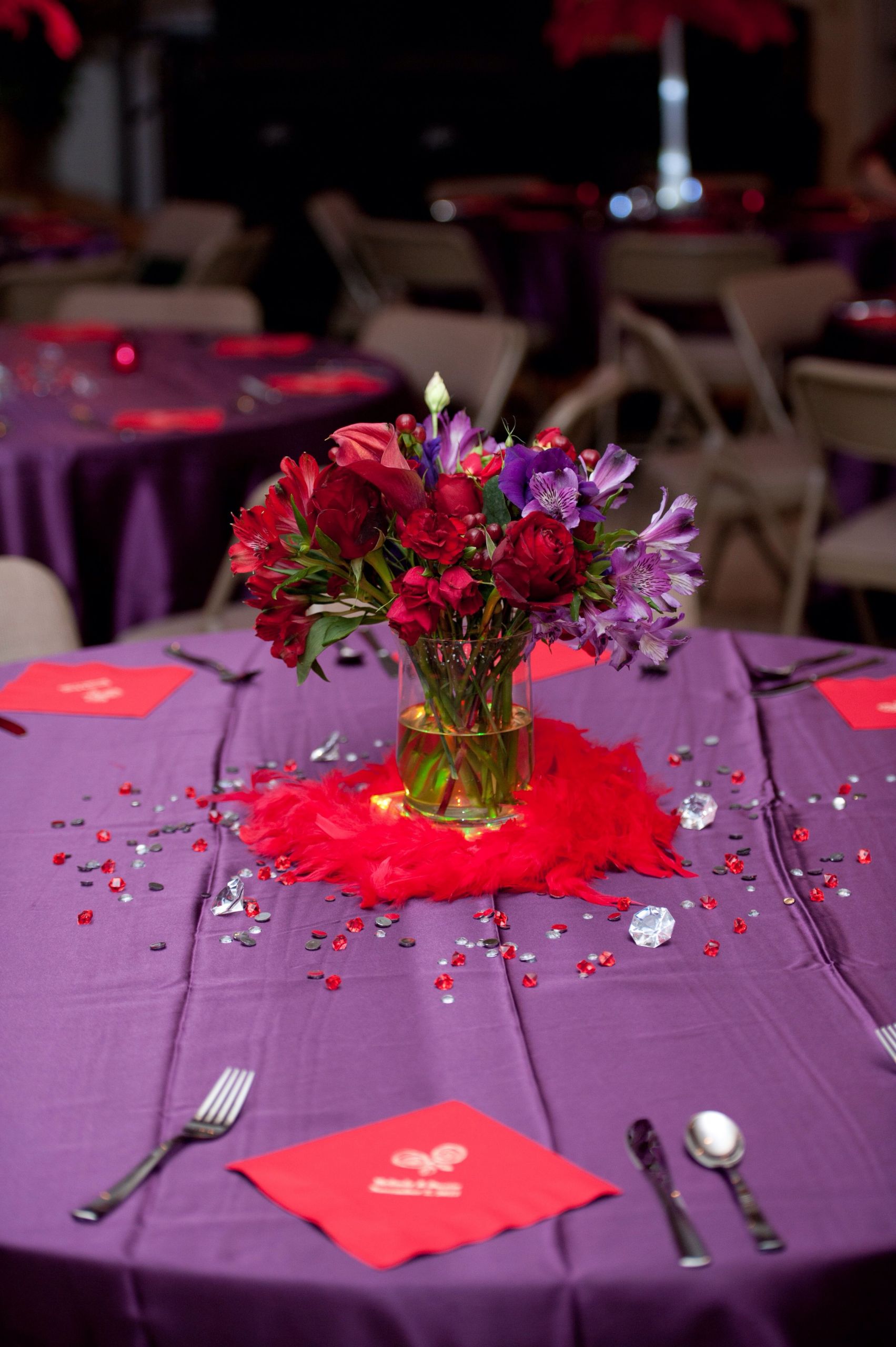 Red And Purple Wedding Theme
 Red and purple reception would use a different center