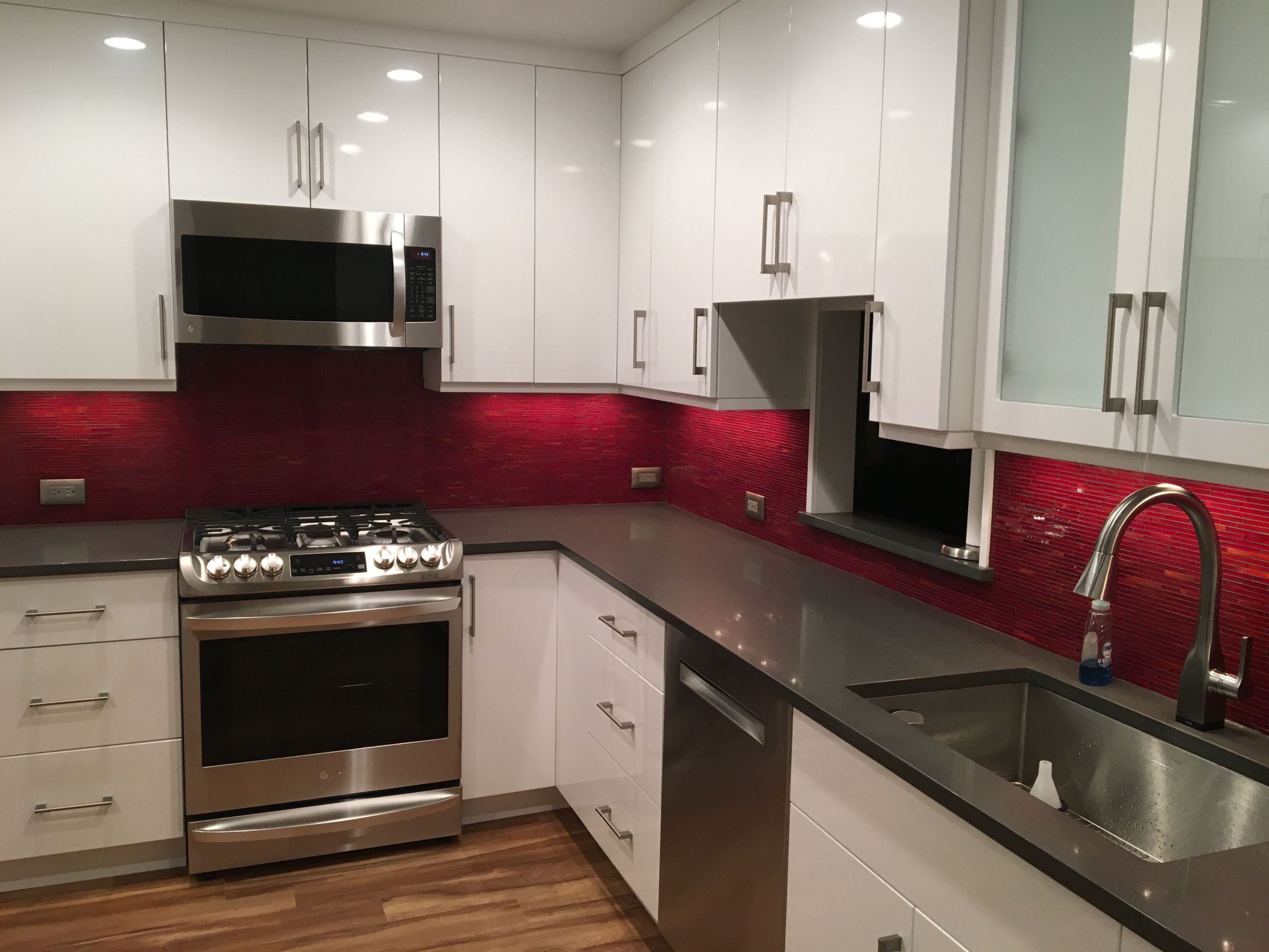 Red Kitchen Backsplash Ideas
 Modern white kitchen cabinets with red glass backsplash