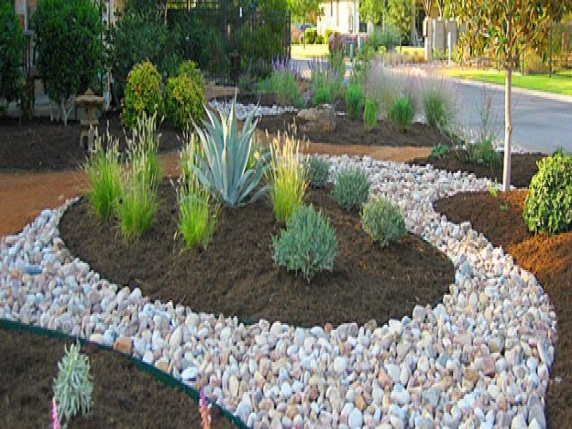 Rock Landscape Design
 River rock garden edging ideas Video and s