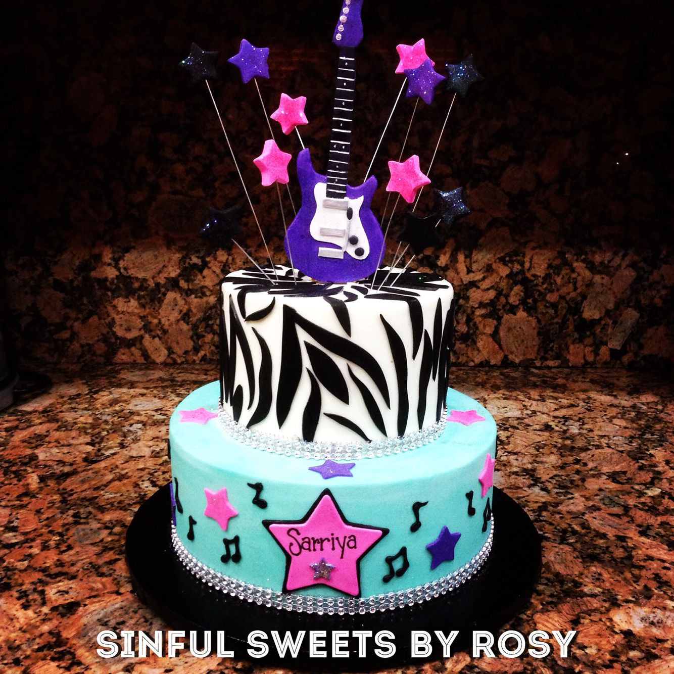 Rock Star Birthday Cake
 Buttercream rock star cake with fondant guitar topper