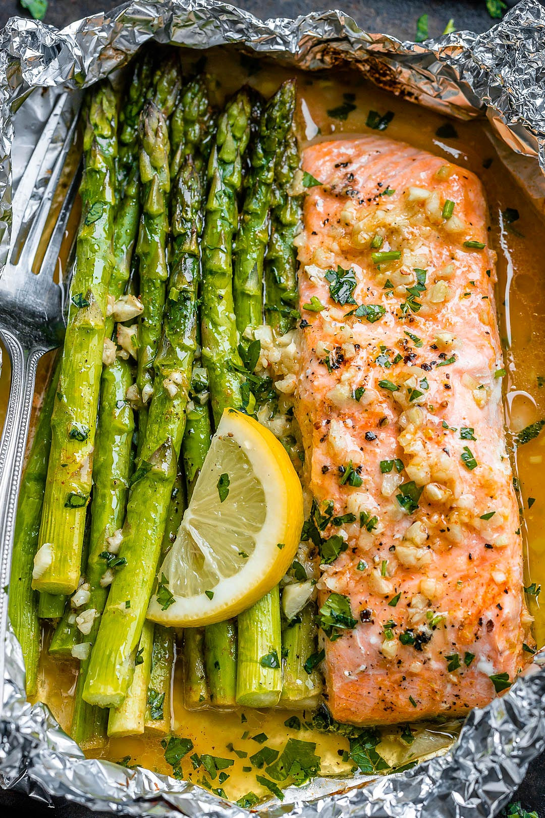 Salmon And Asparagus In Foil
 Salmon and Asparagus Foil Packs with Garlic Butter Sauce