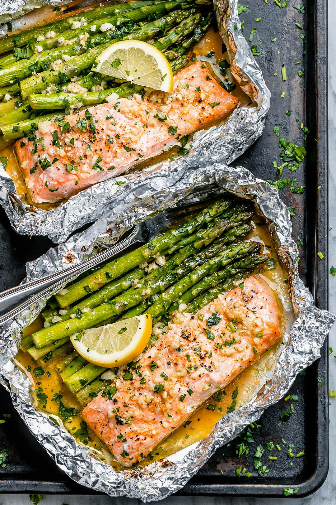 Salmon And Asparagus In Foil
 Salmon and Asparagus Foil Packs with Garlic Butter Sauce