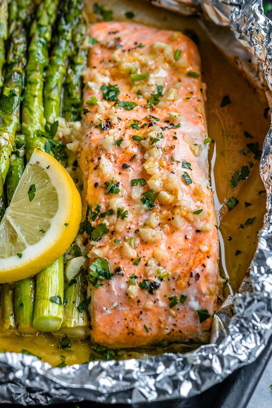 Salmon And Asparagus In Foil
 Salmon and Asparagus Foil Packs with Garlic Butter Sauce