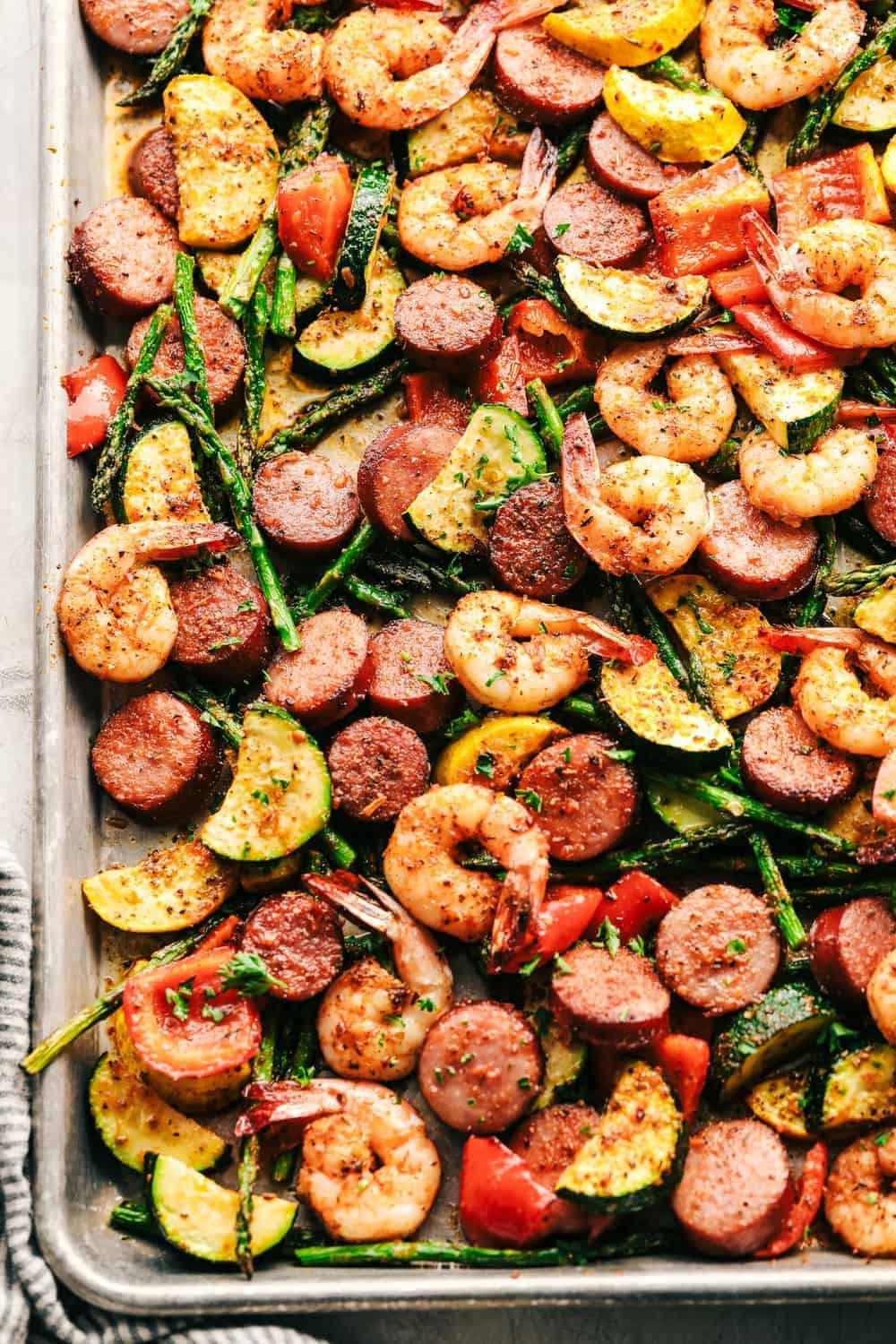 Sausage Sheet Pan Dinner
 Cajun Shrimp and Sausage Ve able Sheet Pan