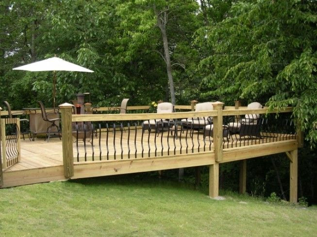 Sloped Backyard Deck Ideas
 Deck built onto sloped yard railings