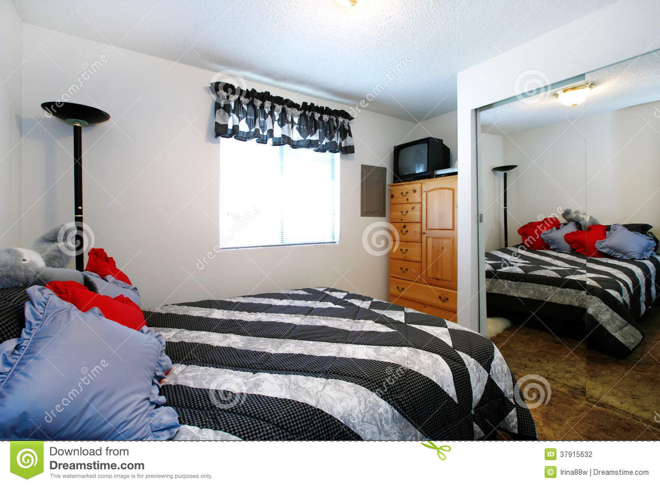 Small Bedroom Size
 Cozy Small Bedroom With Full Size Mirror Stock graphy