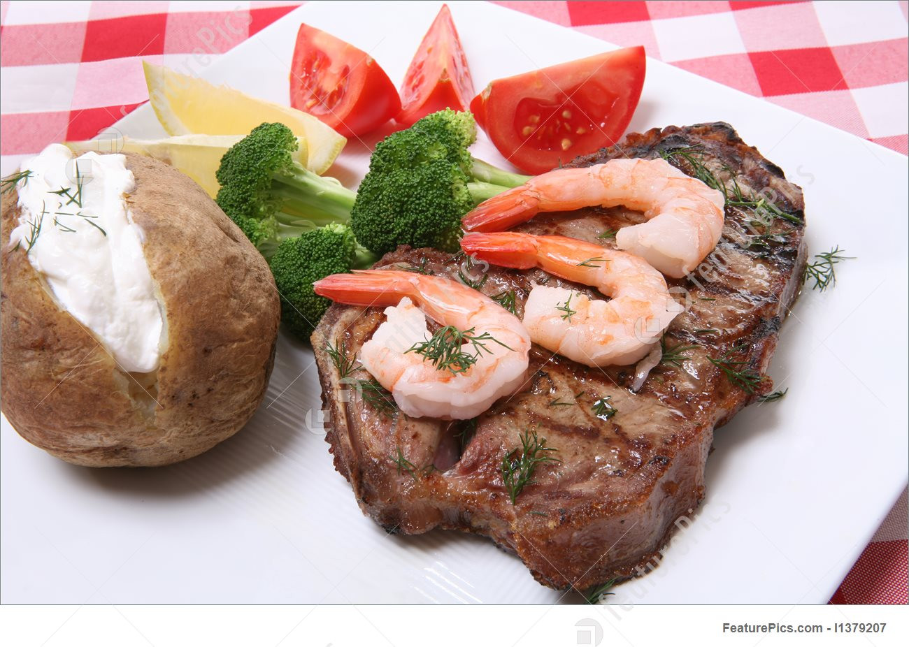 Steak And Shrimp Dinners
 Meat Products Steak And Shrimp Dinner Stock Picture