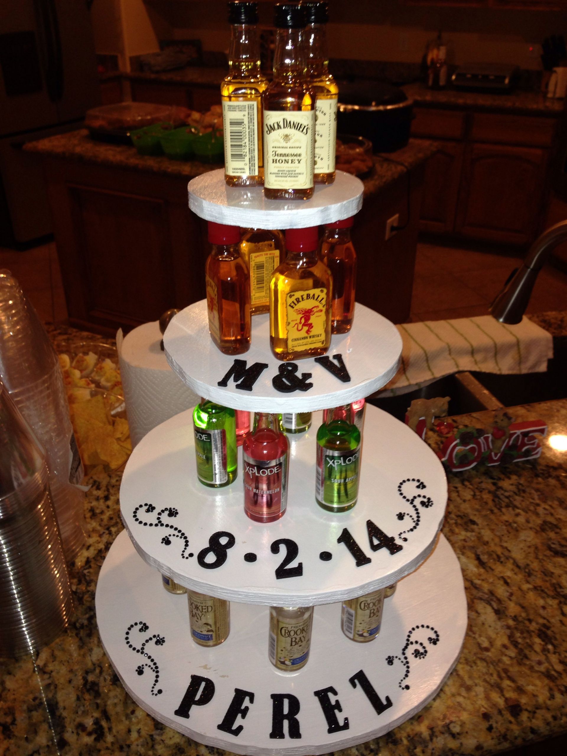 Stock The Bar Engagement Party Ideas
 Stock the bar engagement party liquor cake