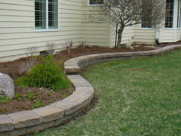 Stone Wall Border Landscape Edging
 Edging Mulch & Drainage Solutions Des Moines Iowa