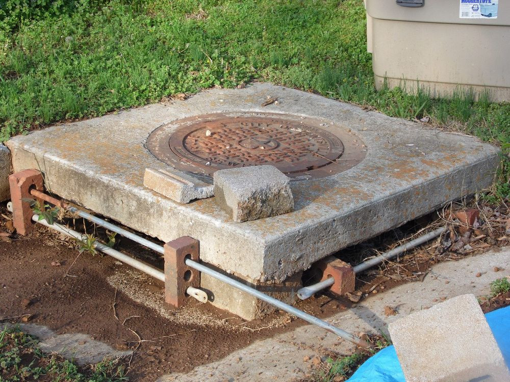 Storm Drain In Backyard
 What is the best way to hide a sewer drain put in my yard