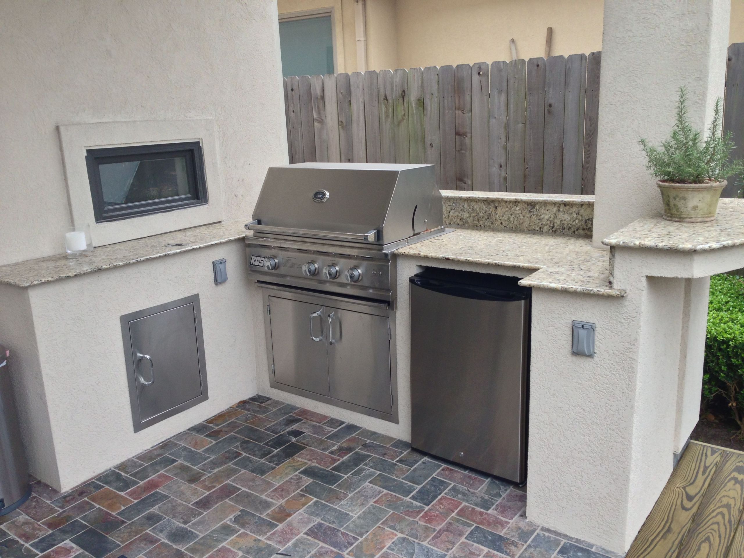 Stucco Outdoor Kitchen
 Custom stucco outdoor kitchen with a small raised counter