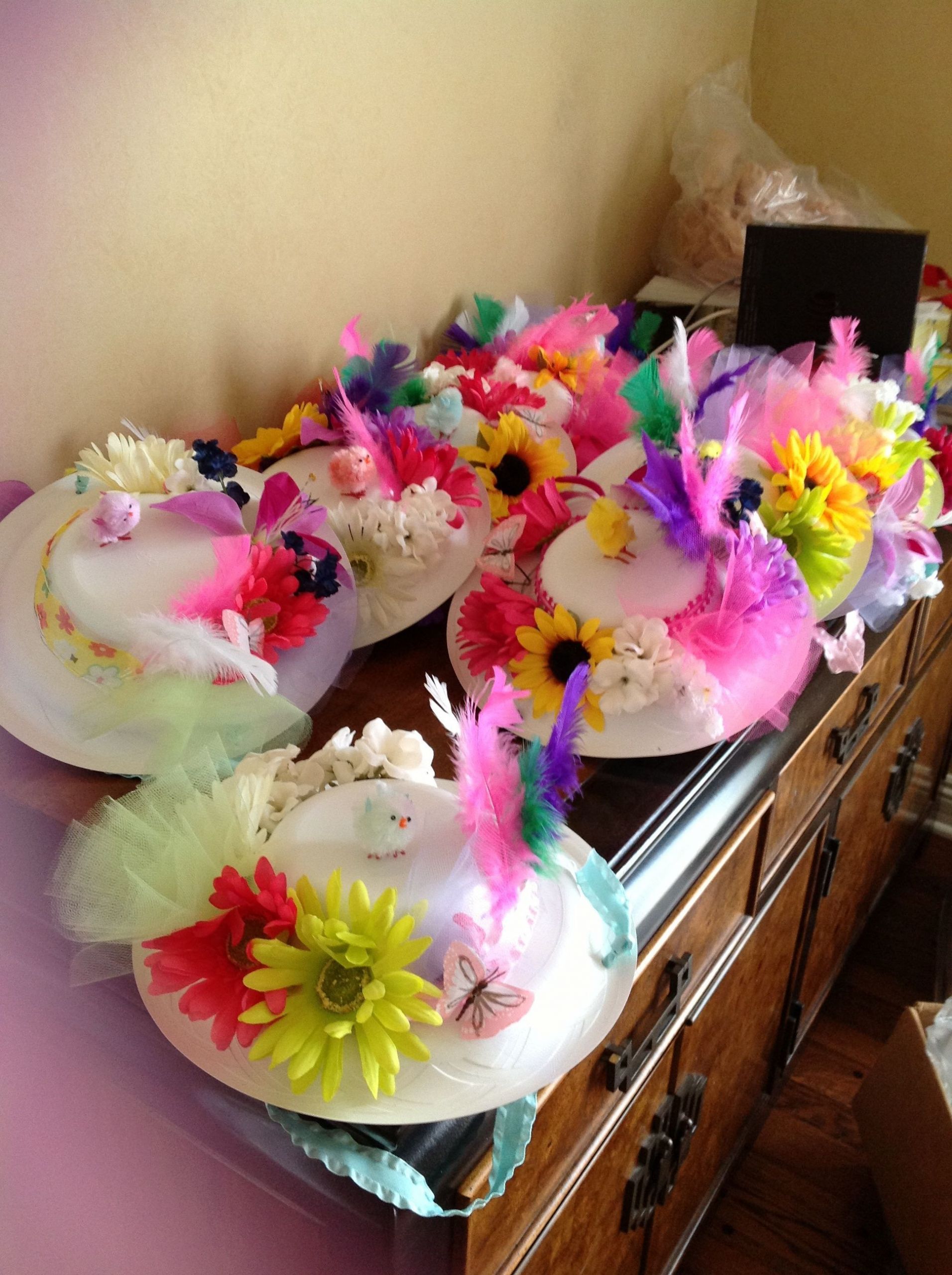 Tea Party Hat Ideas
 I had my troop make tea party hats from Dixie plates for a