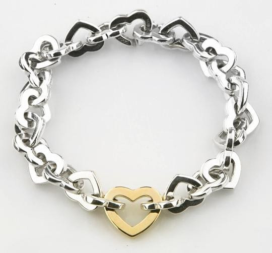 Tiffany Heart Link Bracelet
 Tiffany & Co Vintage Sterling Silver and 18k Gold Heart