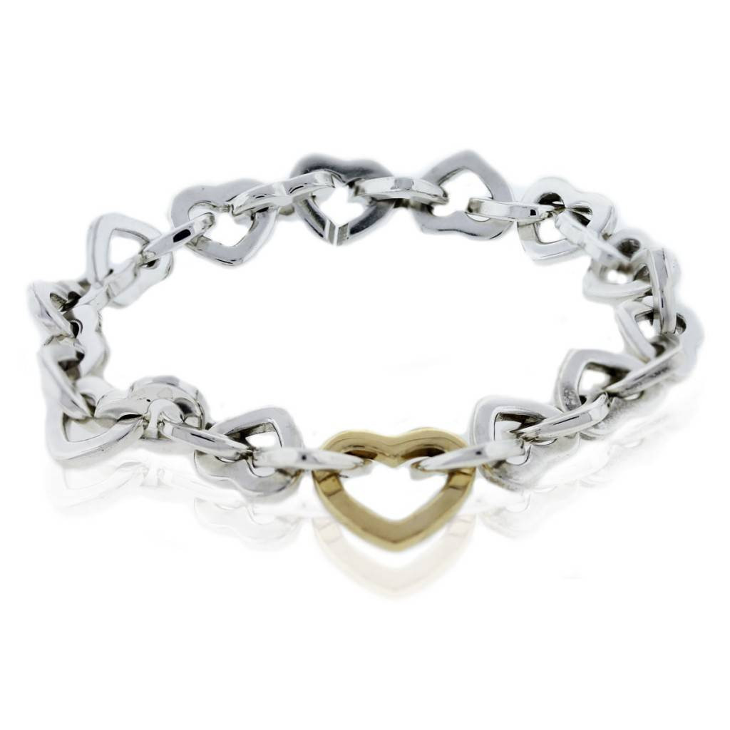 Tiffany Heart Link Bracelet
 Tiffany and Co Sterling Silver 18k Yellow Gold Heart Link