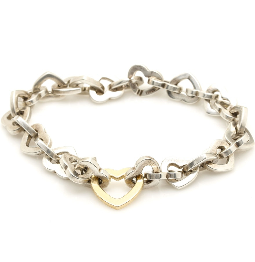 Tiffany Heart Link Bracelet
 Tiffany & Co Sterling Silver and 18K Yellow Gold Heart