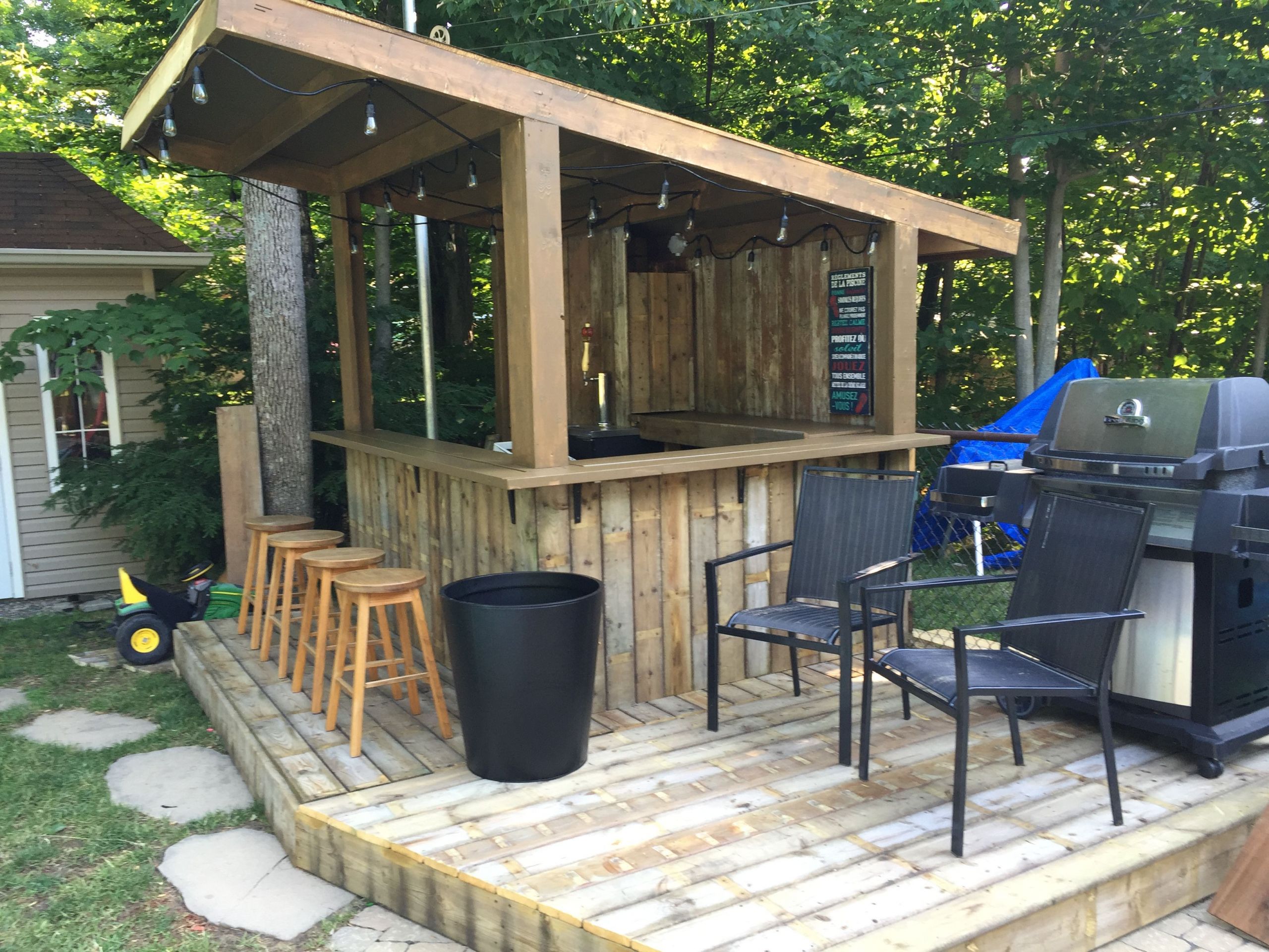 Tiki Backyard Ideas
 Tiki Bar Backyard Pool Bar built with old patio wood