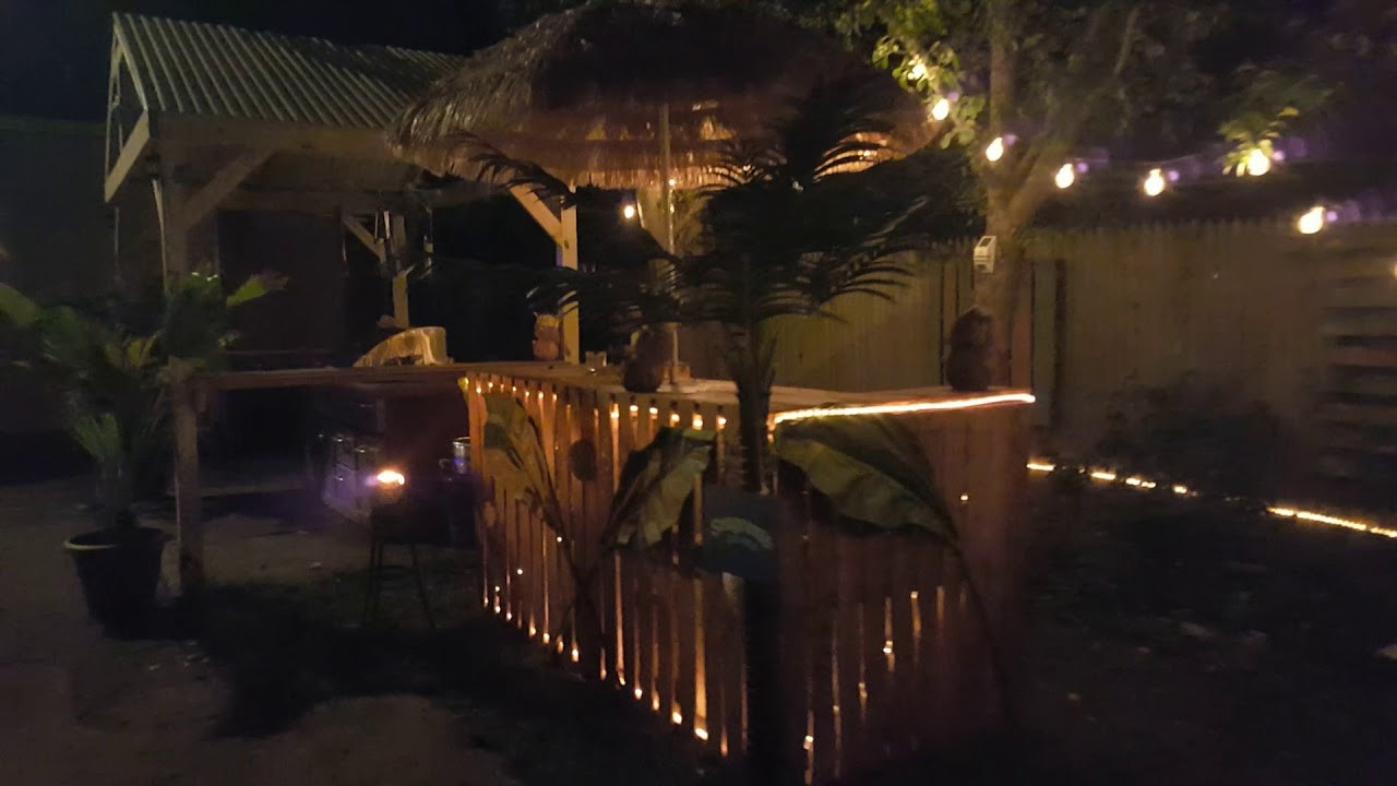 Tiki Paradise In Your Backyard
 Backyard Paradise with DIY tiki pallet bar