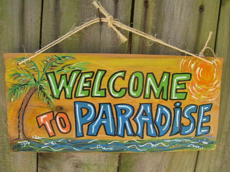 Tiki Paradise In Your Backyard
 Sign "Wel e To Paradise" for your Tiki Bar