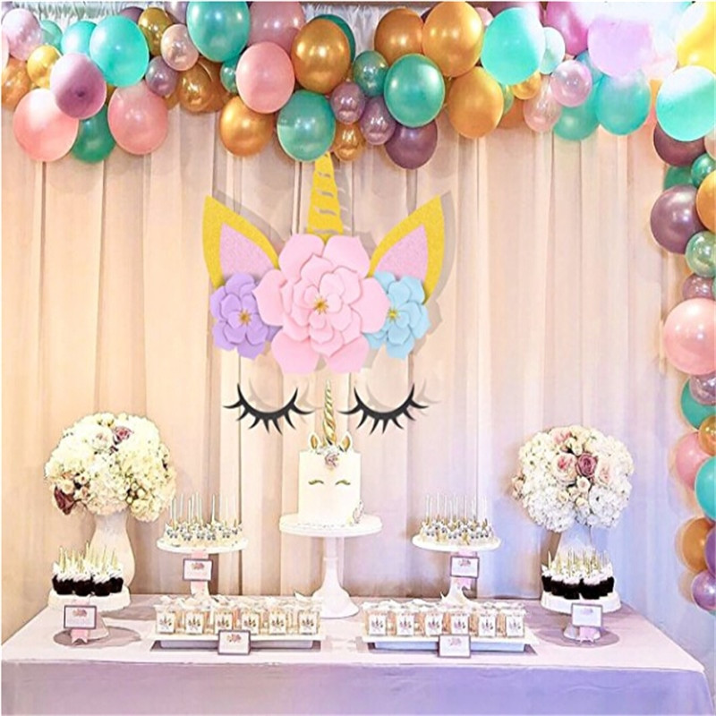 Unicorn Party Decoration Ideas
 Unicorn party horn ears paper eyelashes flowers Backdrops