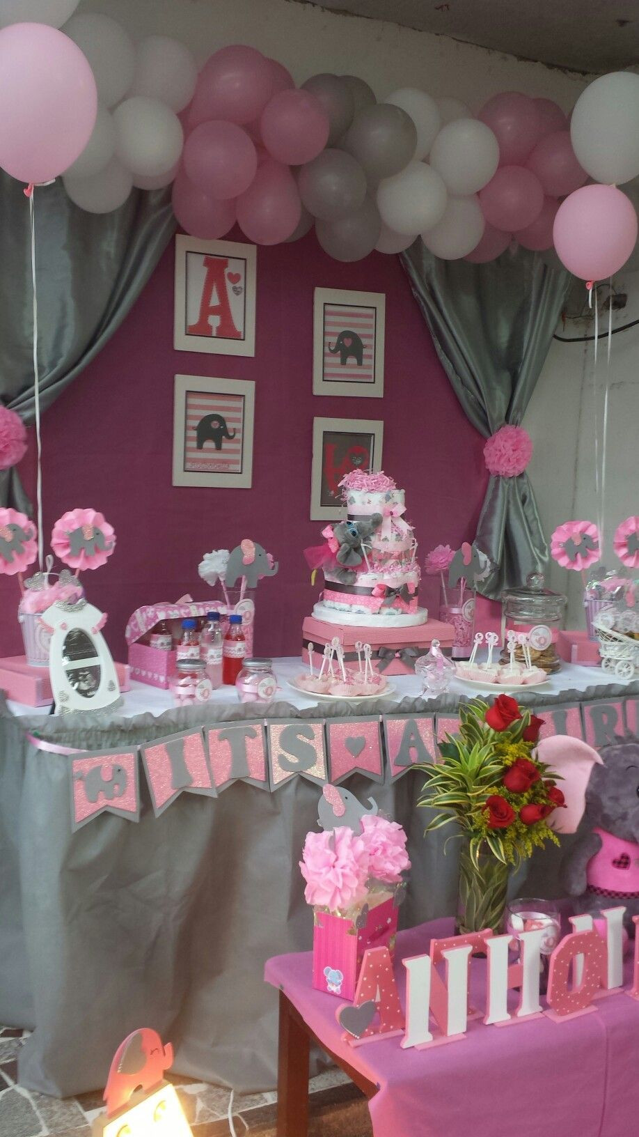 Wall Decor For Baby Shower
 Pink and glitter baby shower themes are perfect for