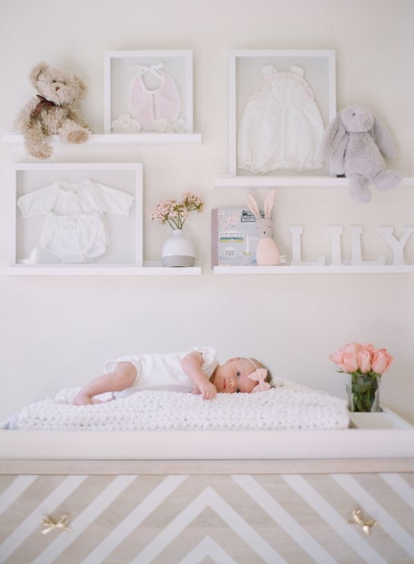 Wall Decorations For Baby Girl Room
 A Blushing Baby Nursery as Pretty as they e