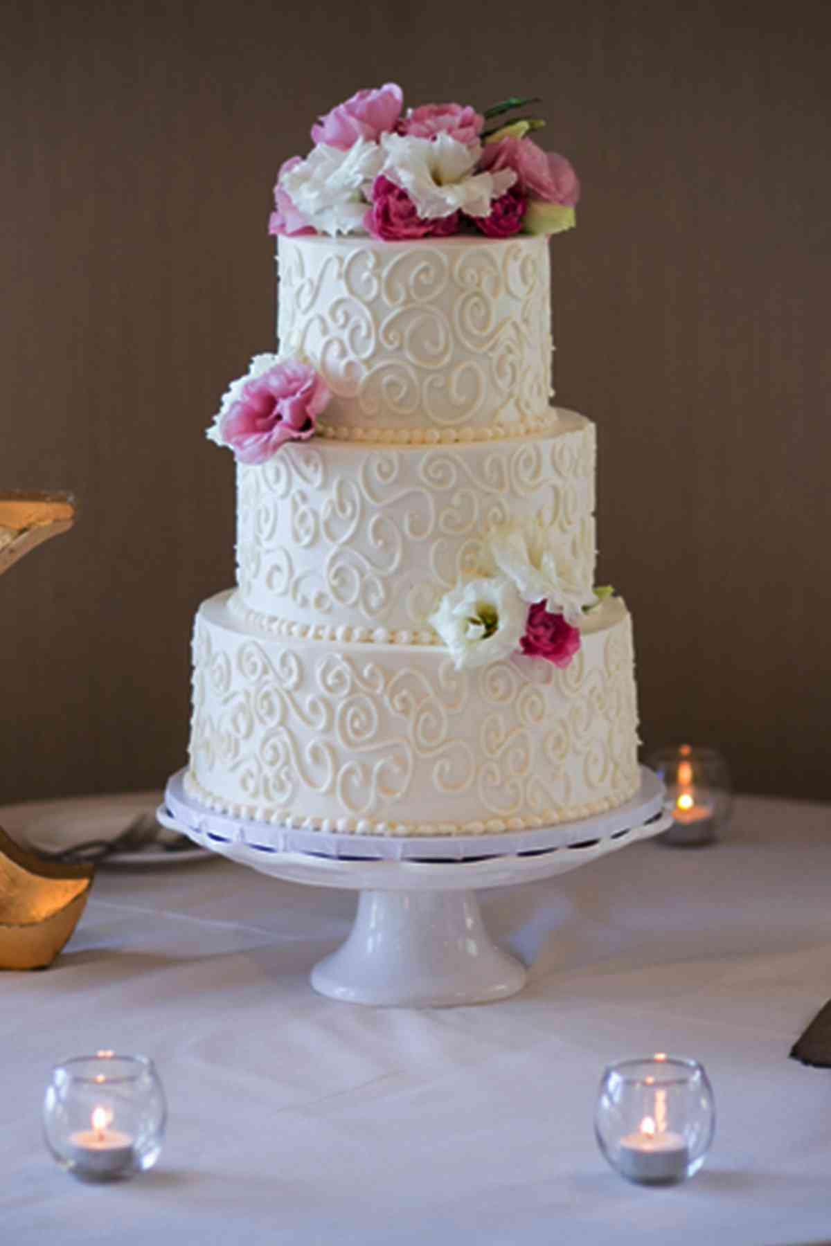 Wedding Cakes Simple
 Simple three layered white wedding cake with swirls