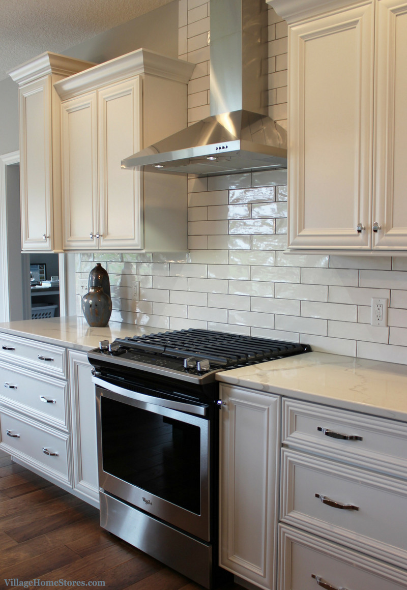 White Kitchen Subway Tile
 Aspen Homes Spring Parade Home with Village Home Stores
