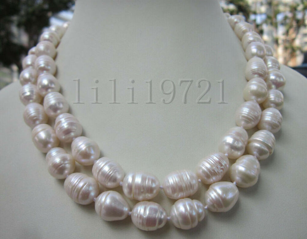 White Pearl Necklace
 9 12MM WHITE FRESHWATER Cultured BAROQUE PEARL NECKLACE 35